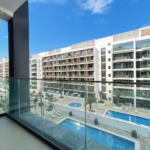 APPARTEMENT D'ANGLE MEUBLÉ | VUE PISCINE | SANS FRAIS DE CLIMATISATION Appartement Dubai 9 - Dubai Immobilier 93831 WhatsApp Image 2025 06 04 at 17.06.16 - Immobilier Dubai